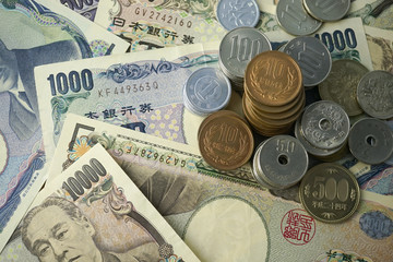 yen notes and yen coins for money concept background

