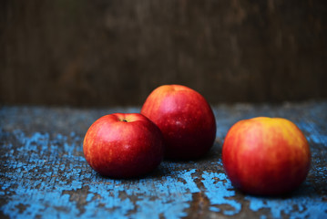 Fresh Fruit Autumnal Red Apple on Old Vintage Grange Wood