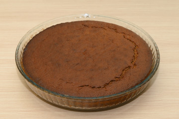 freshly baked cake in the shape of the glass on the table