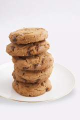 Oatmeal cookies with chocolate drops isolated on white background