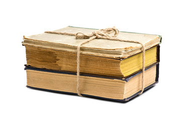 stack of old books tied with rope