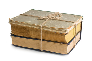 stack of old books tied with rope