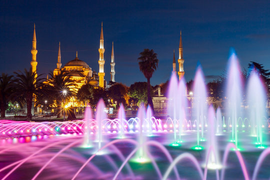 Illuminated Sultan Ahmed Mosque (Blue Mosque) before sunrise, Istanbul, Turkey.