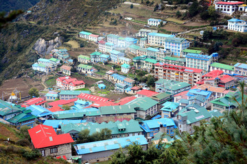 Fototapeta premium Trekking in the mountains, Nepal. Namche Bazar, town in the middle of mountains. 
