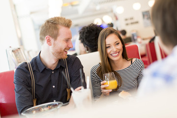 Friends eating in diner