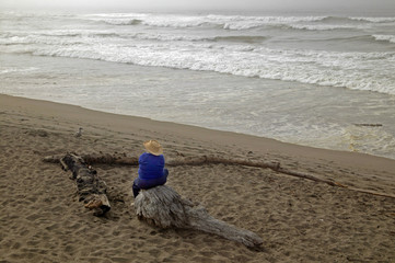 sitting on shore