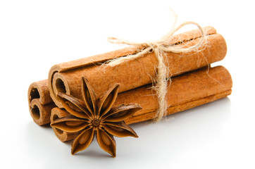 cinnamon stick and star anise spice isolated on white background closeup