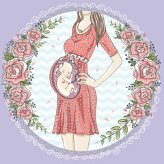 Pregnant woman with cute baby and flower frame.