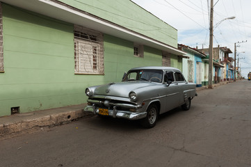 Old automobile car parked in Trinidad, Cuba