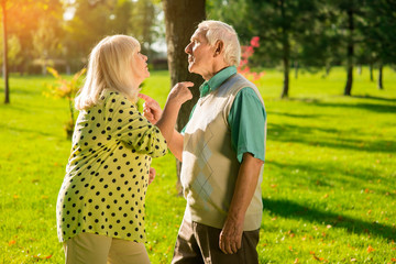 Couple pointing at each other. Man and woman standing outdoor. Escalation of conflict. You're...
