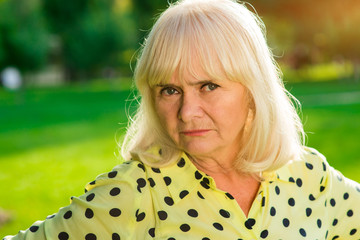 Lady with displeased face. Portrait of older female. Prejudice and expectations. I trust no one.