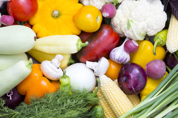 Background of fresh vegetables and greens closeup