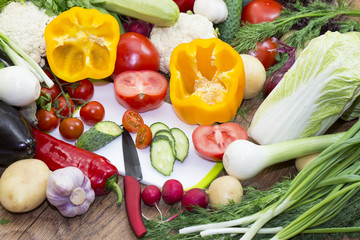 Background of fresh vegetables and greens closeup