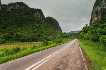 Rural empty road in Vinales Valley in Cuba