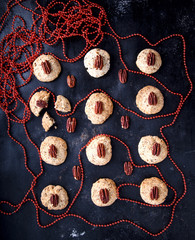 Christmas Cookies with a Pecan on a dark background.Advent.Cakes.selective focus.