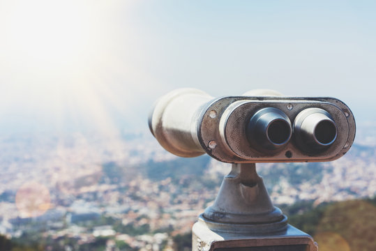 Touristic Telescope Look At The City With View Of Barcelona Spain, Close Up Old Metal Binoculars On Background Viewpoint Overlooking The Mountain, Hipster Coin Operated In Panorama Observation, Mockup