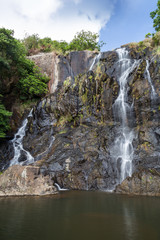 Low water flow at the main fall of the Silvermine Waterfalls on the Lantau Island in Hong Kong, China.