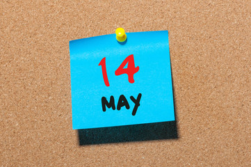 May 14th. Day 14 of month, calendar on cork notice board, business background. Spring time, empty space for text