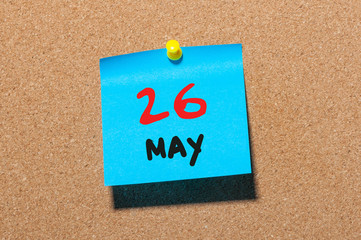May 26th. Day 26 of month, calendar on cork notice board, business background. Spring time, empty space for text