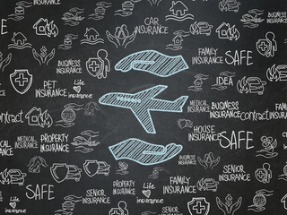 Insurance concept: Airplane And Palm on School board background