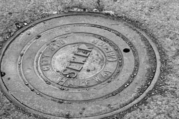 halfway manhole cover