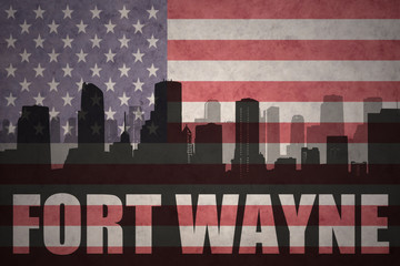 abstract silhouette of the city with text Fort Wayne at the vintage american flag