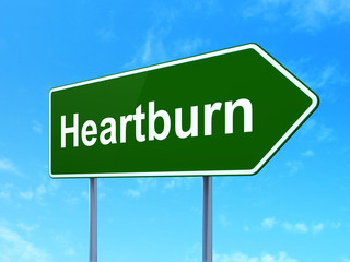 Medicine concept: Heartburn on road sign background