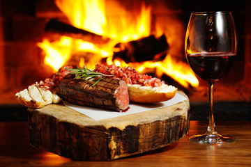 tasty steak on a background of fire