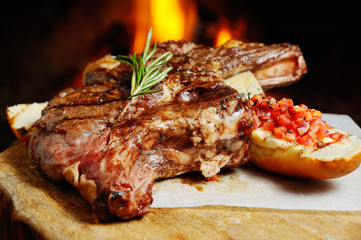 tasty steak on a background of fire