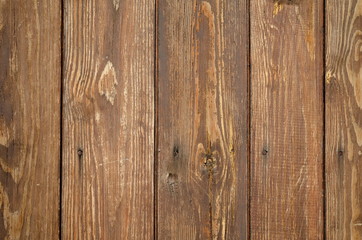 Obraz premium Cracked weathered brown unpainted wooden board texture