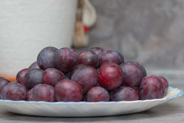 Plums on a plate.