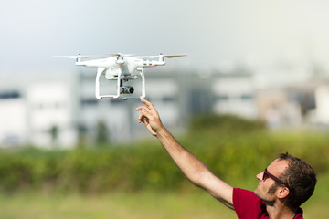 Pilot with his flying drone