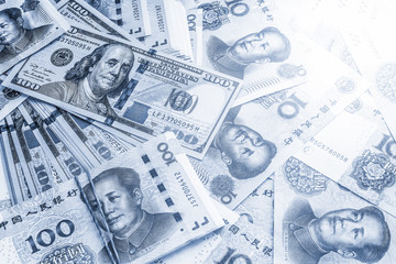 Monochrome image of china and USA money bank notes.