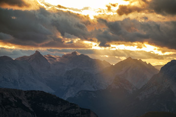 Mountains Panorama of the Dolomites at Sunrise with clouds
