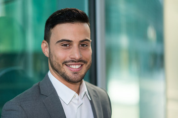 Fototapeta premium Smiling businessman portrait