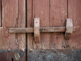 Old wooden and metal gate background
