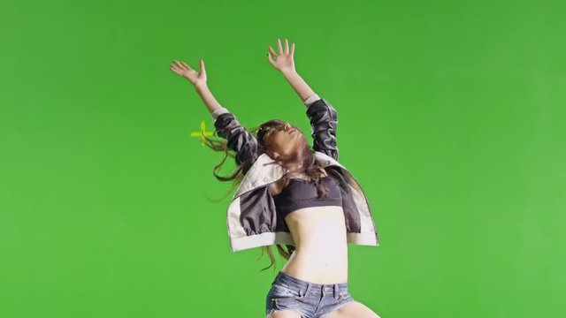 Hot girl dancing. Dances with real strobe lights on body. Slow motion. Green screen. Chroma key. Shot on RED EPIC Cinema Camera.