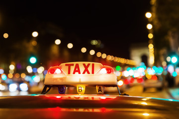 neon sign of a Parisian taxi