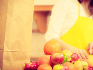 Female cook working in kitchen.