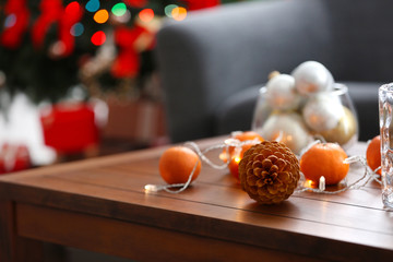 Wooden table with Christmas decoration, close up
