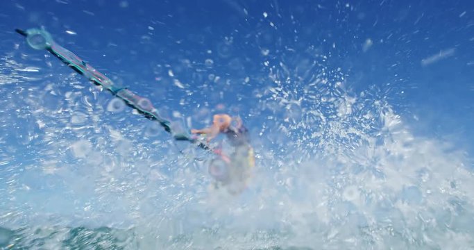 Windsurfer gets big air jumping off wave, Extreme sport