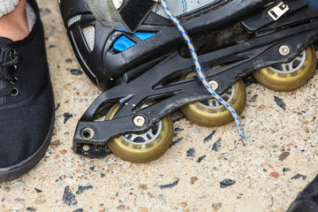 Closeup of roller skates outdoor.