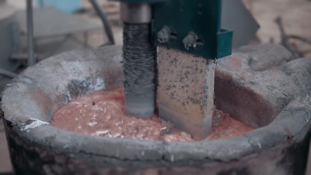 molten metal cleaning by mixer molding and aluminum alloy casting, red hot iron