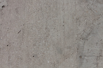 Cement dirty concrete texture closeup. Abstract grunge background of a concrete wall.