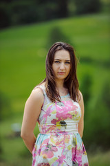 Fototapeta premium Brunette girl enjoying journey in mountains.