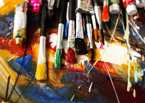 Artist paint brush on painting background