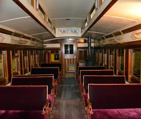 Wanddecoratie Trein V and T Train inside/Inside of vintage railroad travel car.  © bodnarinq
