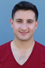 Obraz premium Joyful natural guy against blue background - Stock image