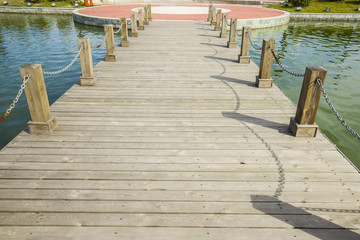 Obraz premium The wood bridge in wetland park