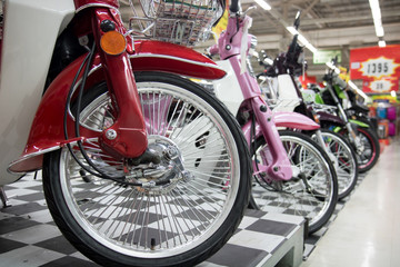 Exhibition of motorcycles in the supermarket section